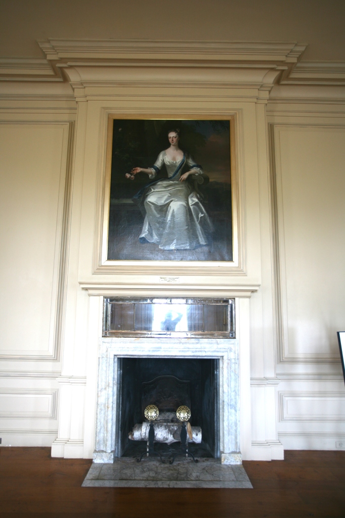 The Living Room's fireplace. Per the Trustees, after Mrs.Crane's death in 1949, the entire contents of the Great House "were sold at auction by Parke-Bernet, held on-site over the course of three days." As the Trustees now restore the interiors at the Crane Estate, paintings and furnishings which resemble the originals used by the Cranes are being installed.