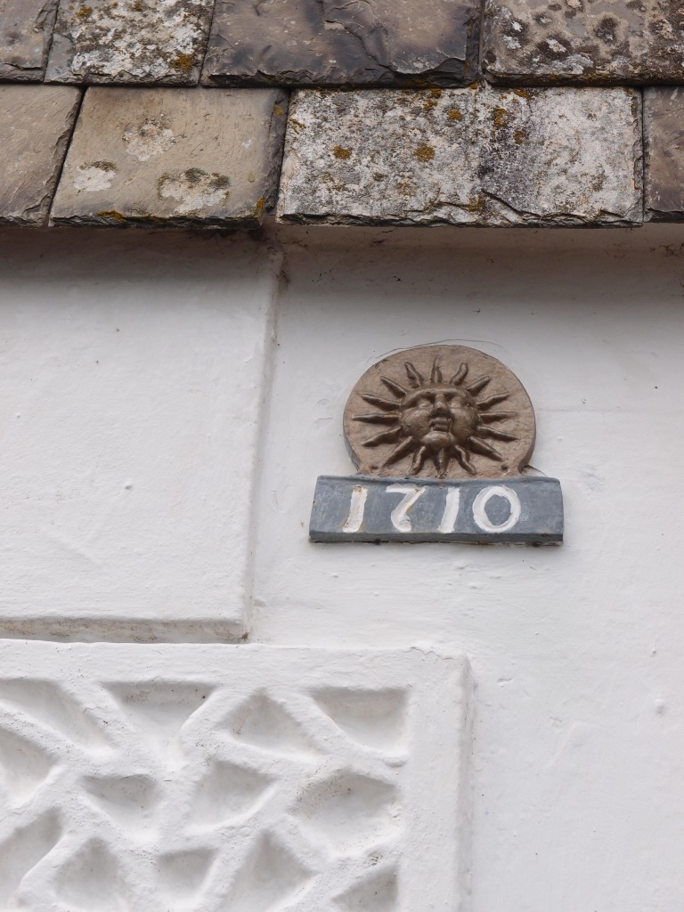 Gull Cottage bears a sunshine medallion, which is a Fire Insurance Mark, circa 1710.